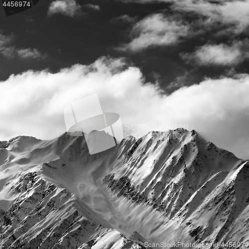 Image of Black and white snow winter mountains and sunlight cloud sky in 