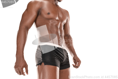 Image of Fit young man with beautiful torso isolated on white background