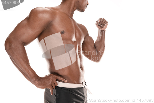 Image of Fit young man with beautiful torso isolated on white background