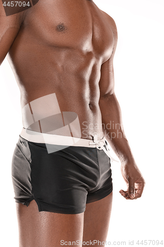 Image of Fit young man with beautiful torso isolated on white background