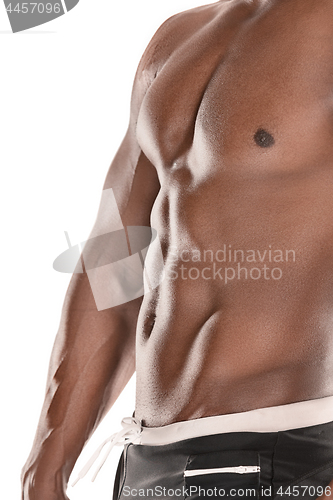 Image of Fit young man with beautiful torso isolated on white background