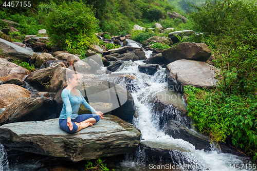 Image of Woman in Padmasana outdoors