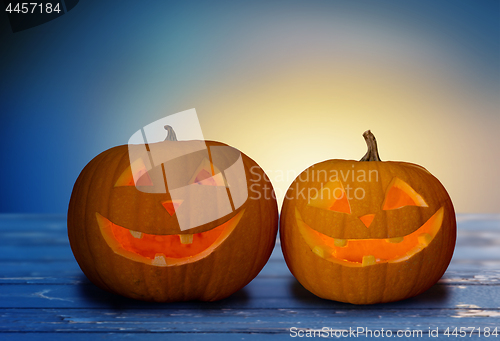 Image of close up of halloween pumpkins on table