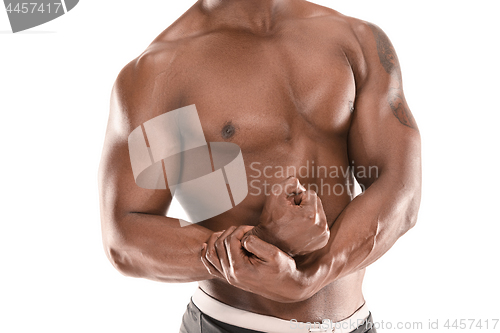 Image of Fit young man with beautiful torso isolated on white background