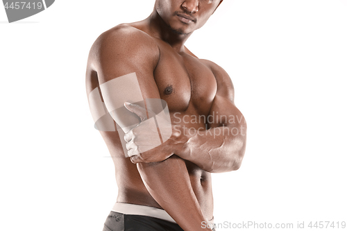 Image of Fit young man with beautiful torso isolated on white background