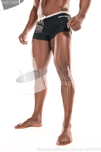 Image of Fit young man with beautiful torso isolated on white background