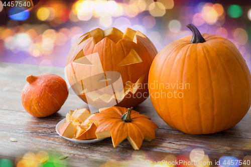 Image of close up of halloween pumpkins on table