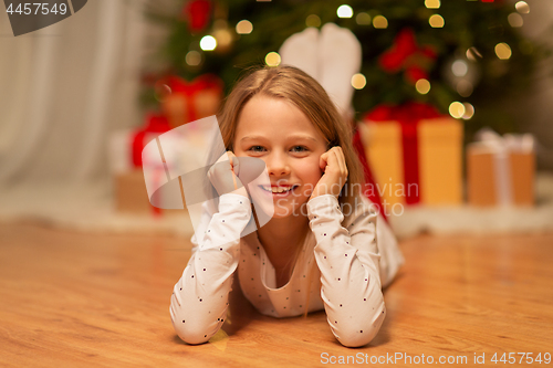 Image of smiling girl at christmas home