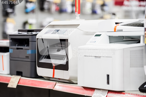 Image of Fiew laser printers in electronic computer store