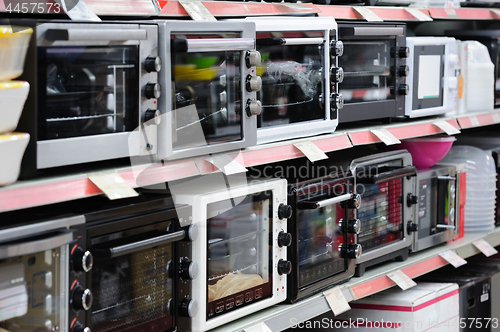 Image of Brand new gas stove panels at appliance store