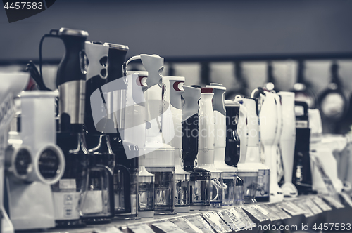 Image of row of variety blenders in retail store