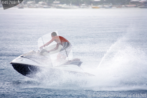 Image of Man on water scooter