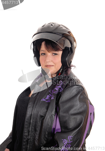 Image of Middle age woman with helmet and jacket