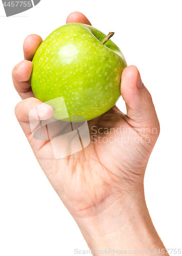 Image of Hand with green apple