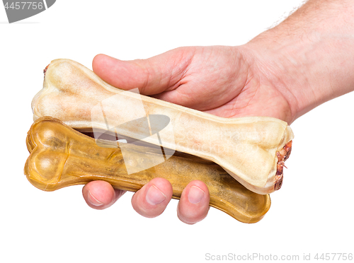 Image of Hand with dog bone