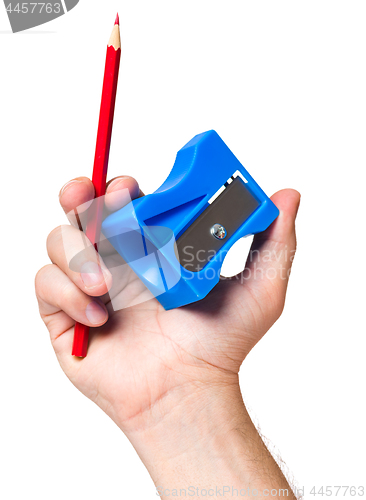 Image of Hand with red pencil