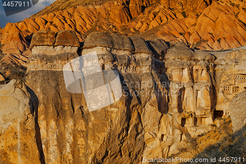 Image of Fairy houses stone cliffs