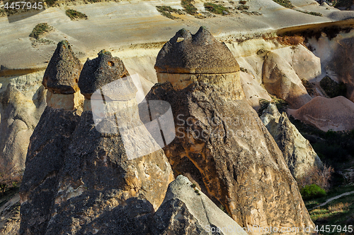 Image of Fairy houses stone cliffs