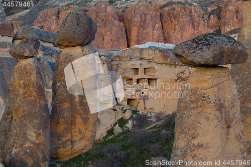 Image of Fairy houses stone cliffs