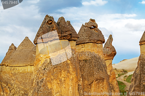 Image of Fairy houses stone cliffs