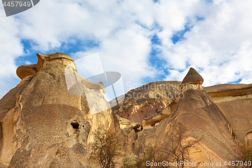 Image of Fairy houses stone cliffs