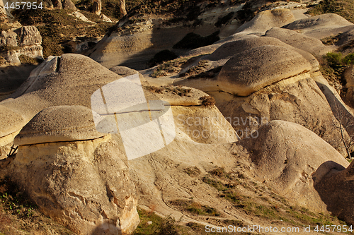 Image of Fairy houses stone cliffs