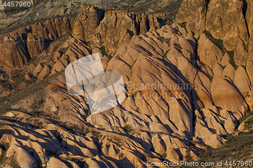 Image of Fairy houses stone cliffs