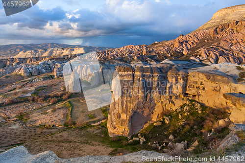 Image of Fairy houses stone cliffs