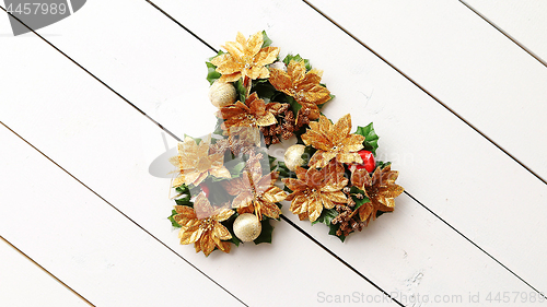 Image of Christmas Wreath on White Wooden Background