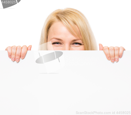 Image of Woman with blank signboard