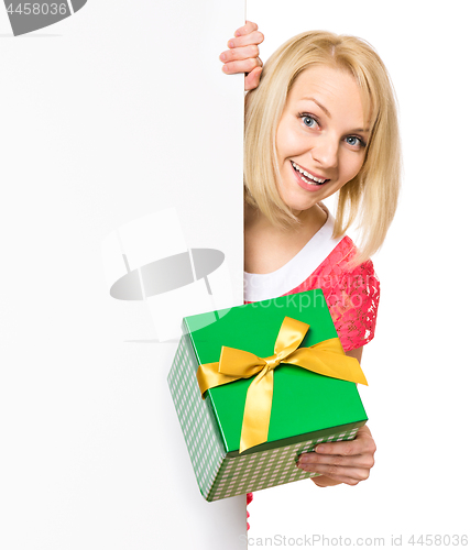 Image of Woman with blank signboard