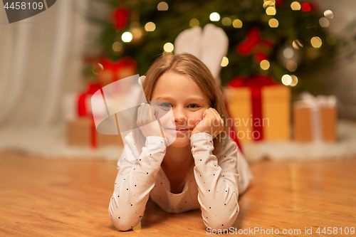 Image of smiling girl at christmas home