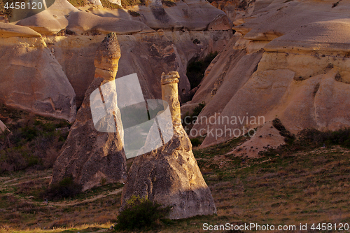 Image of Fairy houses stone cliffs