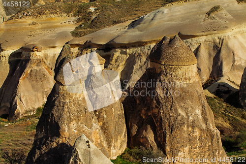 Image of Fairy houses stone cliffs