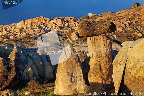 Image of Fairy houses stone cliffs