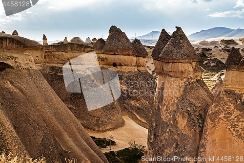 Image of Fairy houses stone cliffs