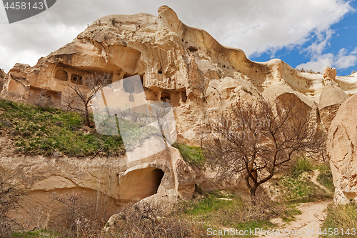 Image of Fairy houses stone cliffs