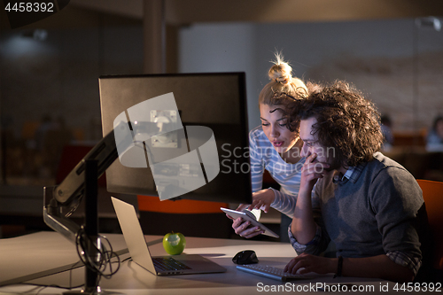 Image of young designers in the night office