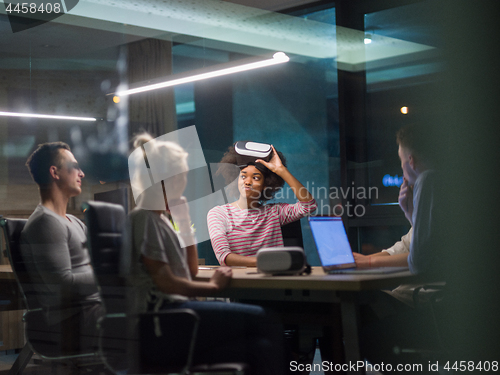 Image of Multiethnic Business team using virtual reality headset