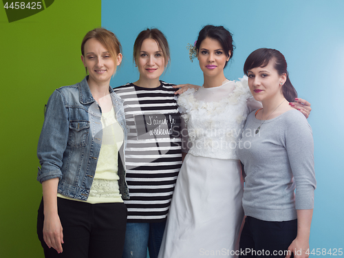 Image of Bride with bridesmaids on the wedding day