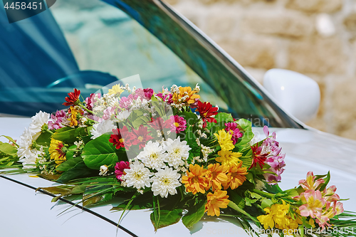 Image of Bouquet on the Car Bonnet