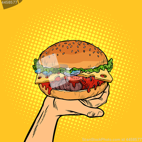 Image of Burger on hand. fast food