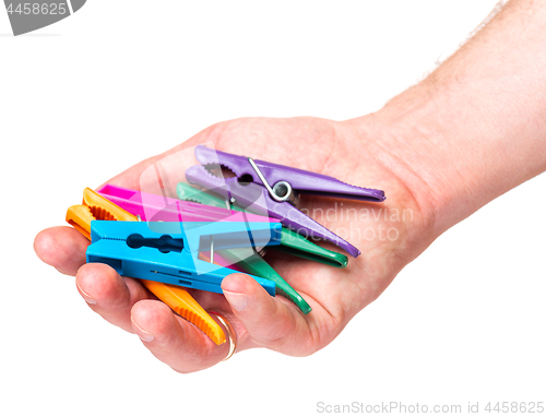 Image of Hand with color clothespin