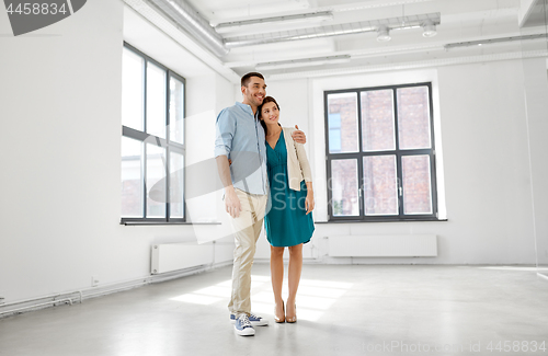 Image of happy couple at new home