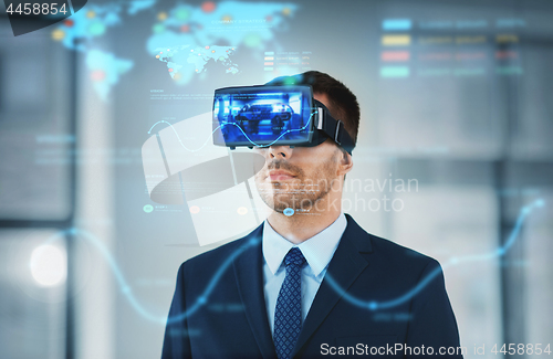 Image of businessman with virtual reality headset at office