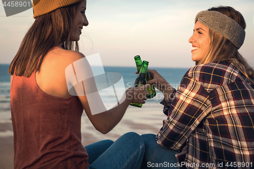 Image of Making a toast on the beach