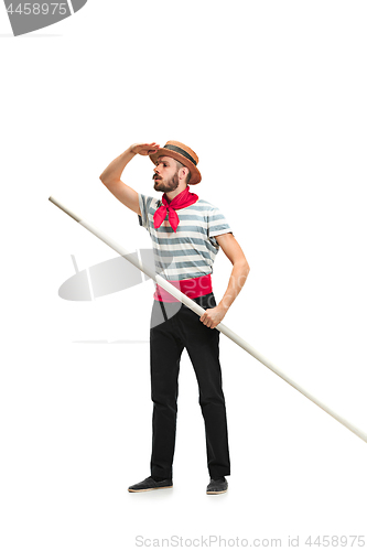 Image of Caucasian man in traditional gondolier costume and hat