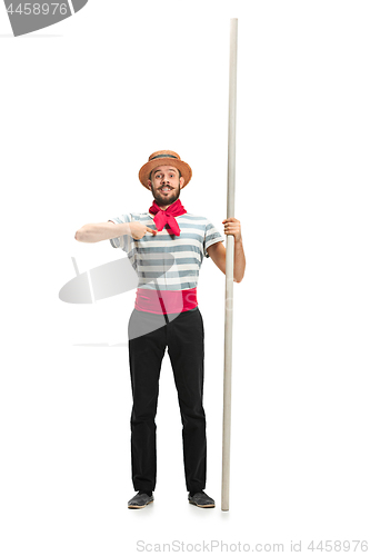 Image of Caucasian man in traditional gondolier costume and hat