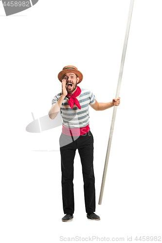 Image of Caucasian man in traditional gondolier costume and hat