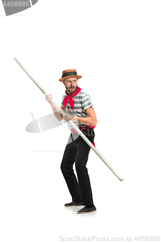 Image of Caucasian man in traditional gondolier costume and hat